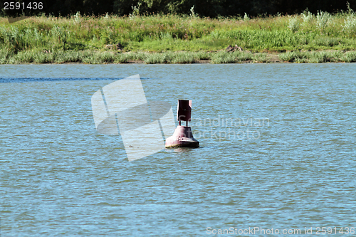 Image of old buoy on Danube river