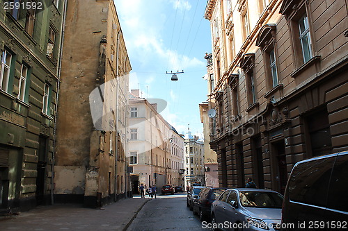 Image of street in Lvov with parked cars