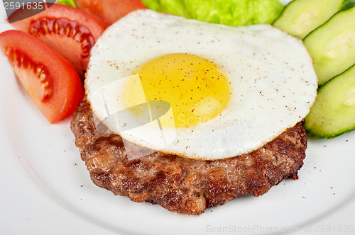 Image of steak beef meat with fried egg