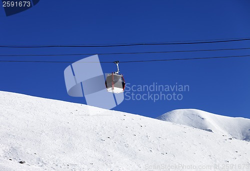 Image of Gondola lift and off piste ski slope