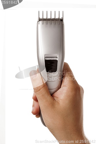 Image of hair clipper in hand