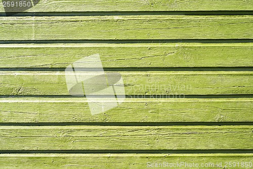 Image of wooden green wall