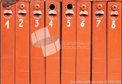 Image of eight old mail boxes background