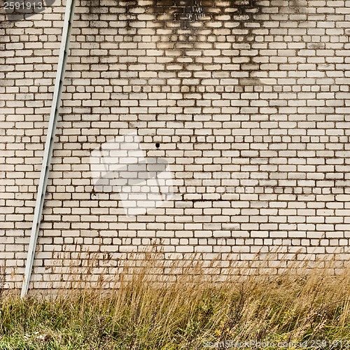 Image of weathered brick wall