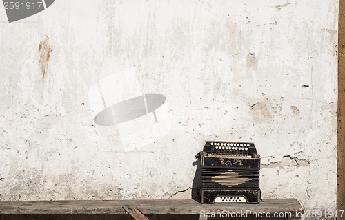 Image of wall and accordion