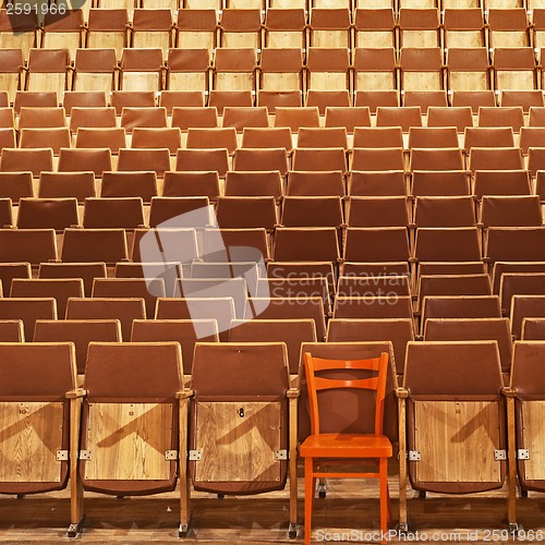 Image of Theater Seat, front side, one red book