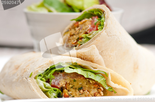 Image of falafel pita bread roll wrap sandwich