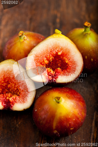 Image of fresh figs over old wood