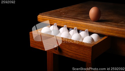 Image of eggs on old table