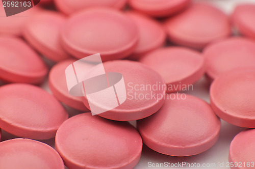 Image of Scattering of pink tablets