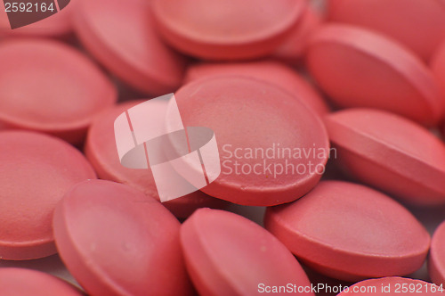 Image of Scattering of pink tablets