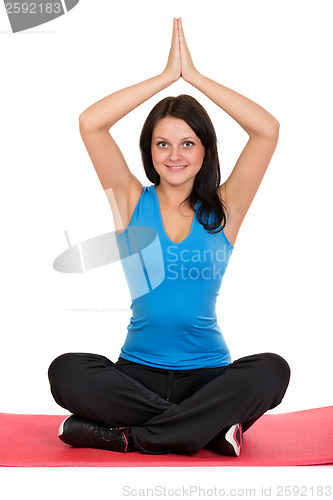 Image of Beautiful girl doing yoga