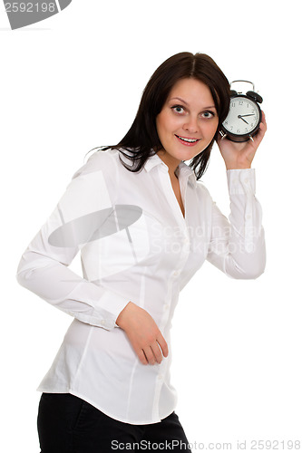 Image of beautiful girl with alarm clock