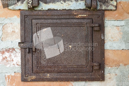 Image of door of old stove