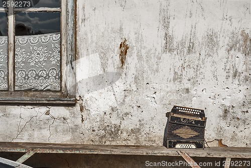 Image of accordion on the bench