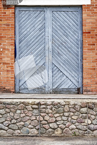 Image of blue wooden plank doors