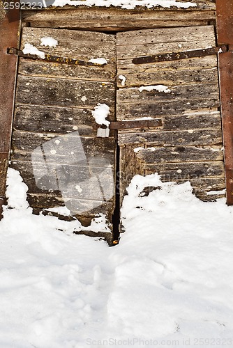 Image of wooden door of old mill