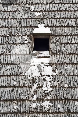 Image of plank wall with a window