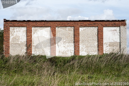 Image of Old house,  weathered brick wall