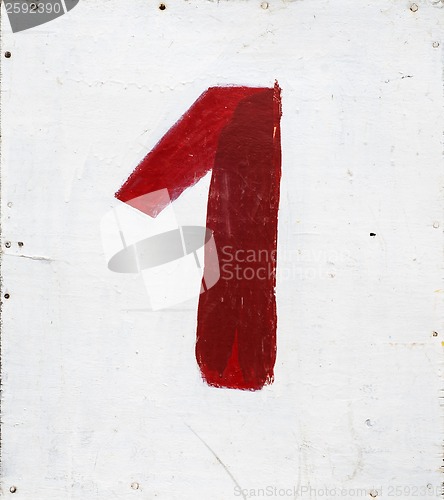 Image of number one on white plywood board