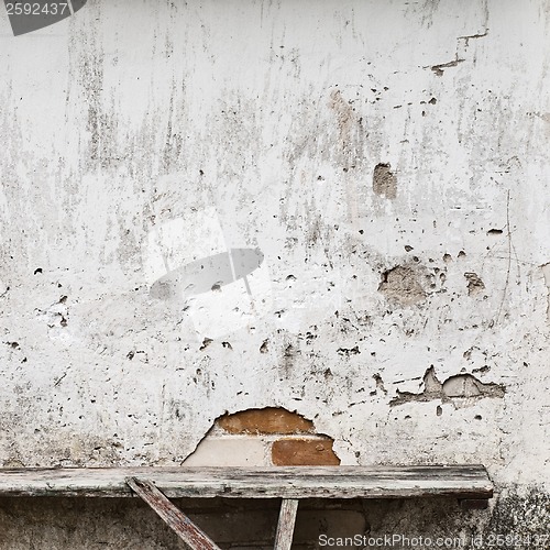 Image of bench near the wall background