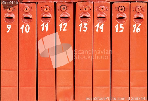 Image of eight old mail boxes background