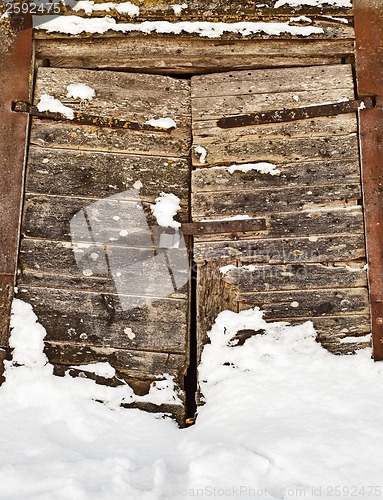 Image of wooden door of old mill