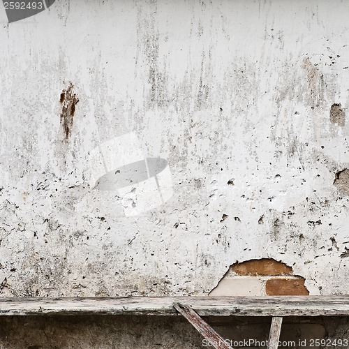 Image of bench near the wall background