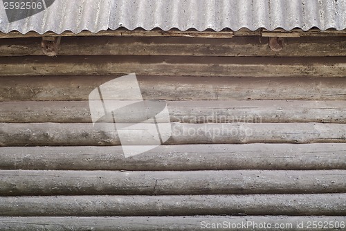 Image of round log wall background