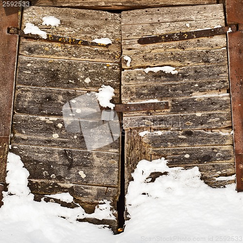 Image of wooden door of old mill