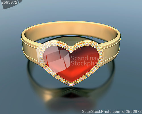 Image of gold ring with a heart shape ruby