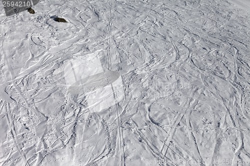 Image of Traces of skis and snowboards on off-piste slope