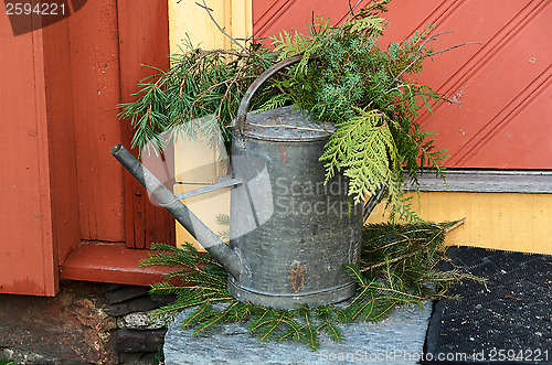 Image of old watering can