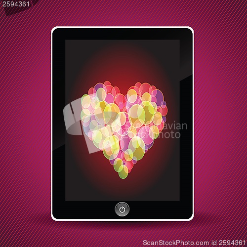 Image of tablet computer and heart