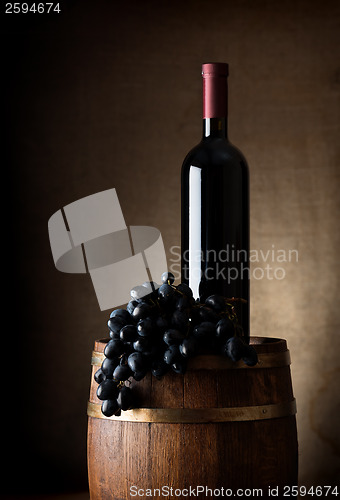 Image of Barrel and bottle of wine