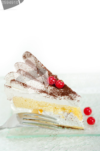 Image of whipped cream and ribes dessert cake slice