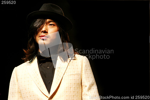 Image of Asian male model on the catwalk during a fashion show - EDITORIA