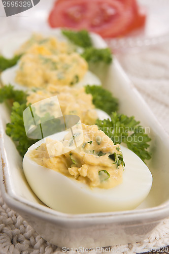 Image of Stuffed eggs with parsley and mayonnaise 