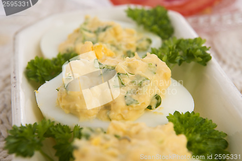 Image of Stuffed eggs with parsley and mayonnaise 