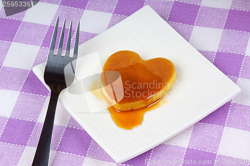 Image of Mini heart-shaped pancake with syrup