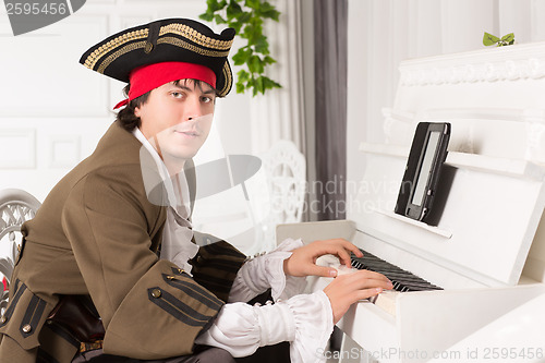 Image of Man playing the piano