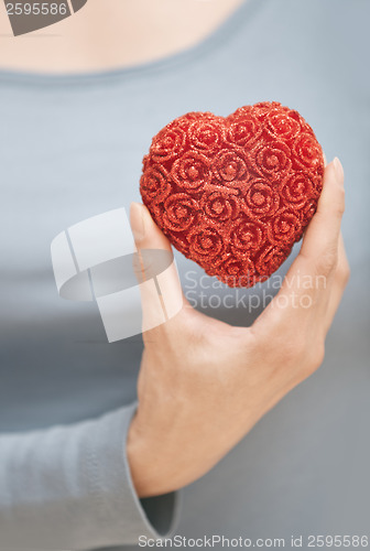 Image of Holding heart