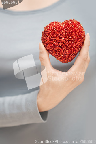 Image of Holding heart