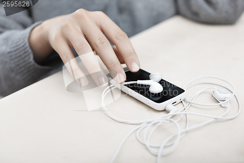 Image of Smartphone with earphones