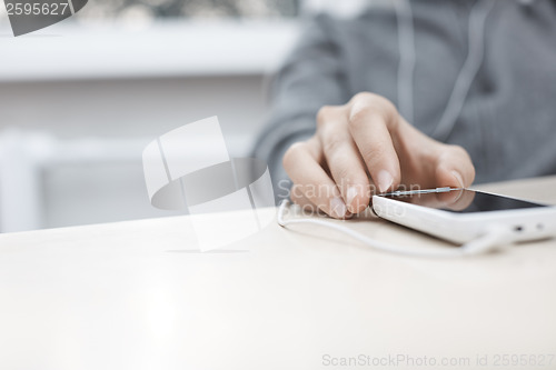 Image of Smartphone with earphones