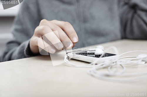 Image of Smartphone with earphones