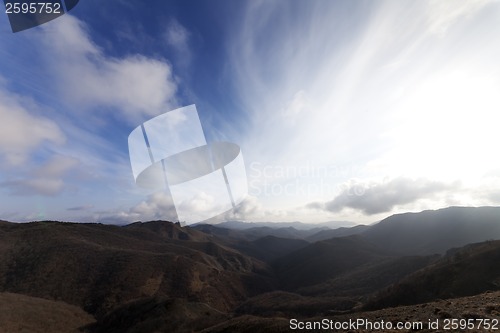 Image of Mountains and blue sky with clouds