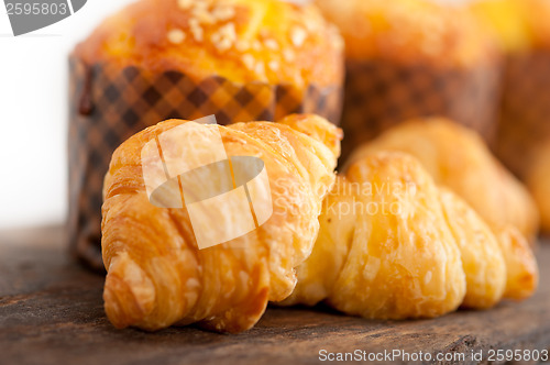 Image of fresh baked muffin and croissant mignon