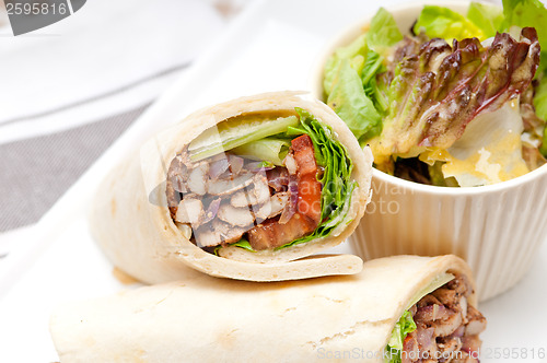 Image of kafta shawarma chicken pita wrap roll sandwich