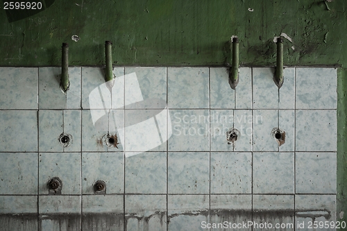 Image of Old tiled wall of an industrial building